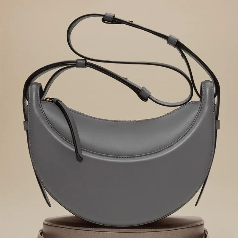 2025 French fashion genuine leather women's shoulder bag, crescent bag, niche design zipper closure shoulder crossbody bag