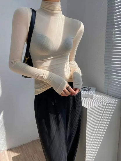 Korean style standing collar long sleeved T-shirt, high collar bottom shirt, women's slim fit slightly transparent top
